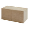 Light oak wooden storage cabinet with a smooth, minimalistic design and natural grain pattern.