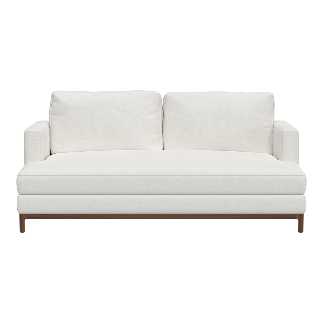 White modern sofa with clean lines and plush cushions, featuring a sleek wood base. Perfect for contemporary decor.