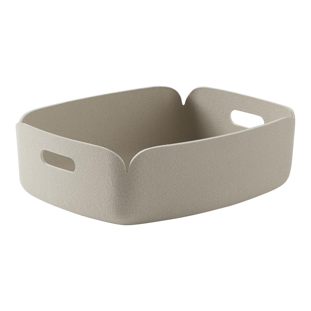 Beige textured storage basket with rounded corners and cut-out handles for easy carrying. Perfect for stylish organization.