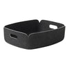Stylish dark grey felt storage basket with white trim and cut-out handles, perfect for modern decor.