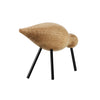 Wooden bird figurine in natural oak finish with black metal legs. Smooth, rounded shapes with a minimalist design.