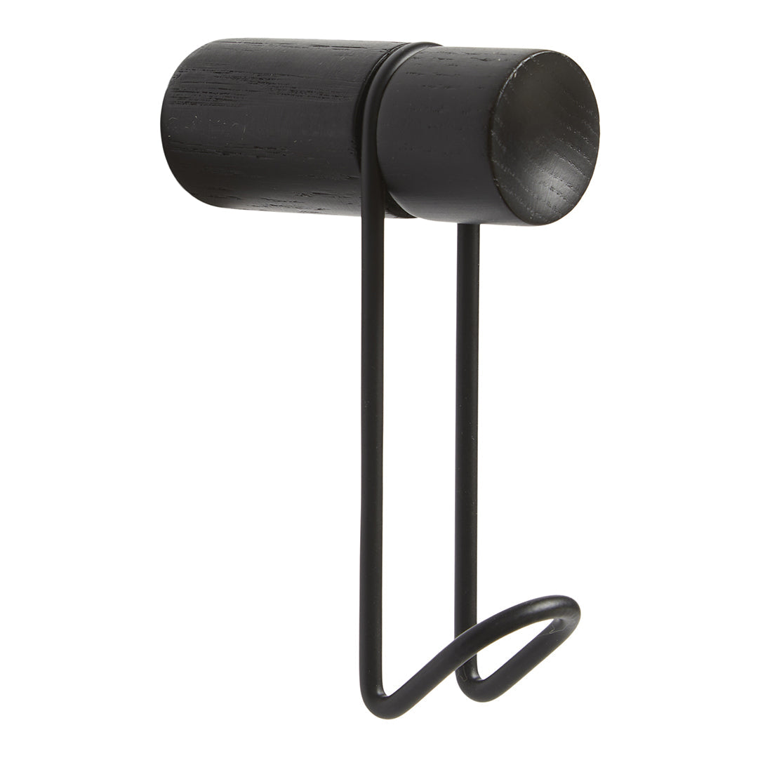 Black metal wall hook featuring a sleek cylindrical design and simple curved wire support. Elegant and minimalist style.