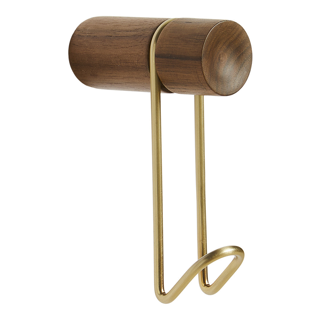Walnut wood and gold metal wall hook with a sleek, modern design. Elegant color contrast and minimalistic pattern.