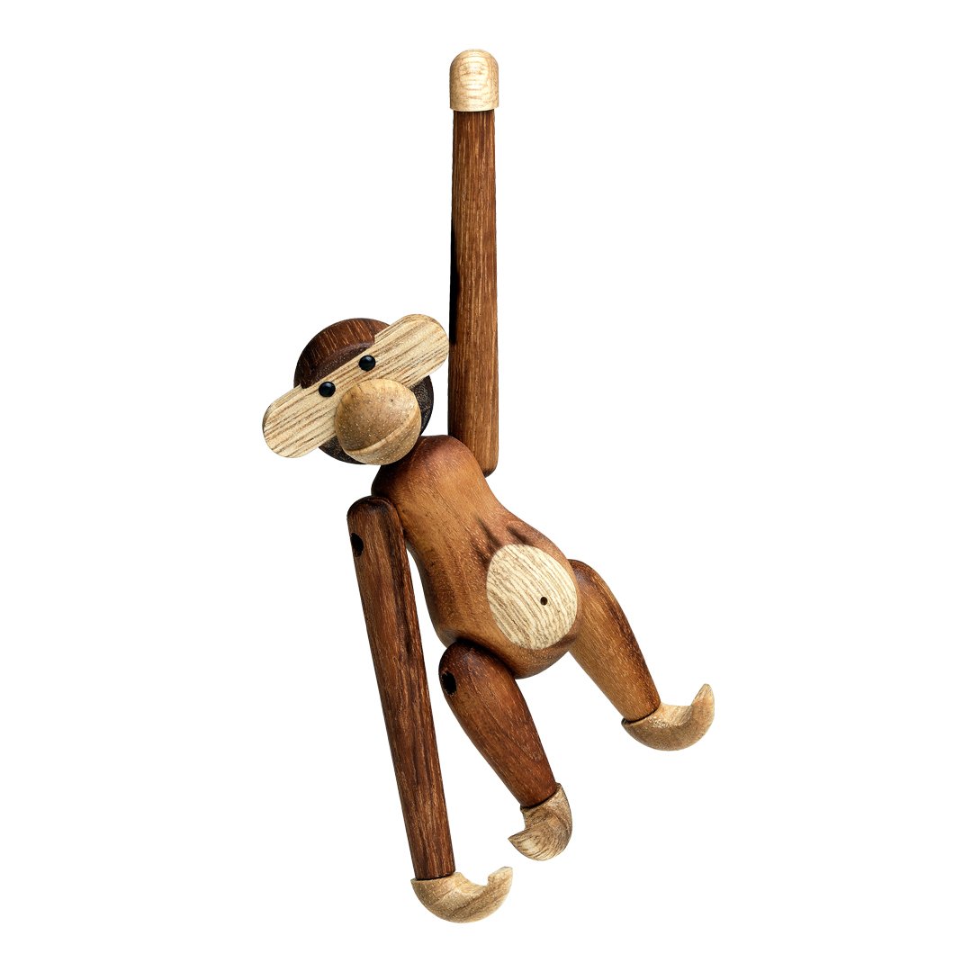 Wooden monkey figurine with brown and beige colors, featuring a playful design and articulated limbs.
