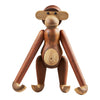 Wooden monkey figure in rich brown tones with natural wood grain patterns and smooth finishes. Ideal for decor.