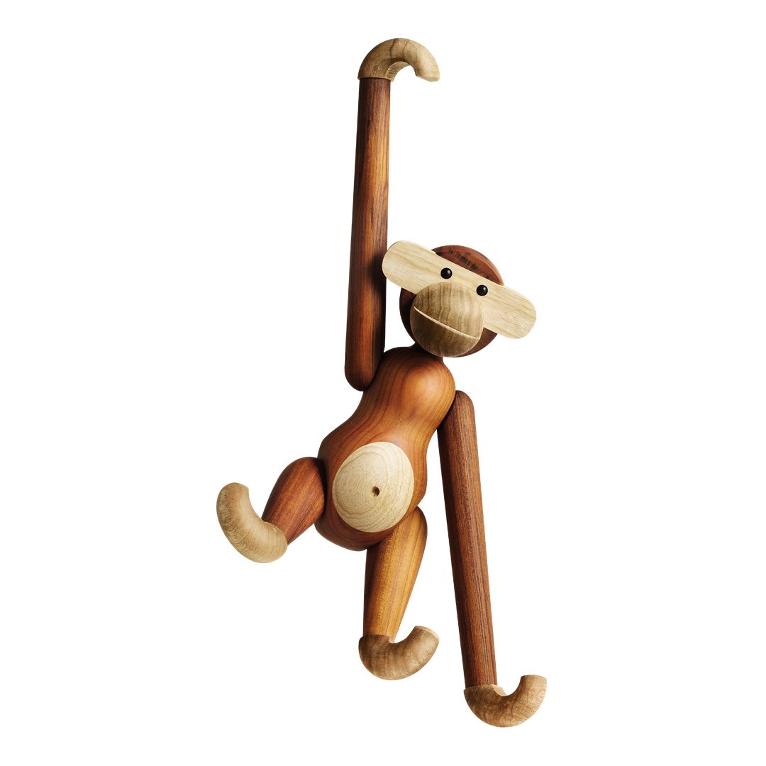 Wooden monkey figurine in shades of brown with natural wood accents and smooth, rounded features. Playful design.