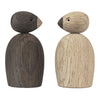 Wooden bird figurines featuring a dark brown and light beige color scheme with minimalist shapes and smooth textures.