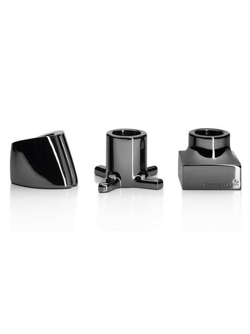 Three glossy black accessory pieces showcasing sleek, modern designs and smooth surfaces.