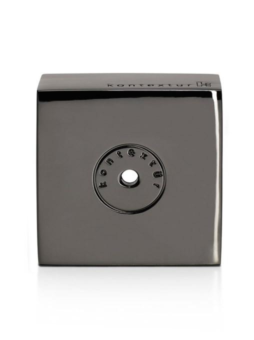 Glossy black square shape with a circular design, highlighted with a sleek metallic finish.